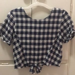 A navy blue checkered cropped shirt